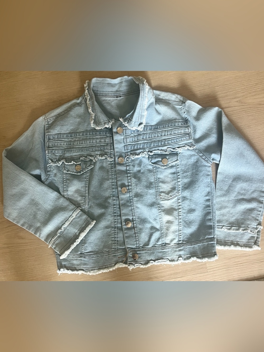 Light Blue Denim Jacket with Frayed Trim